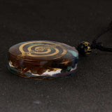 Collier amulette 7 chakras en Orgonite