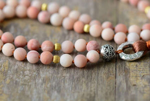 Collier de perles Bouddhiste en aventurine rose